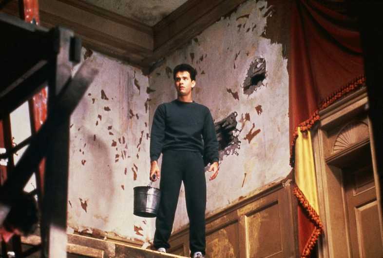 Tom Hanks in a house that is falling apart
