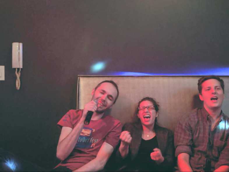 Marisa Morby, Dustin Schau, and Michal Piechowiak getting in on the Karaoke